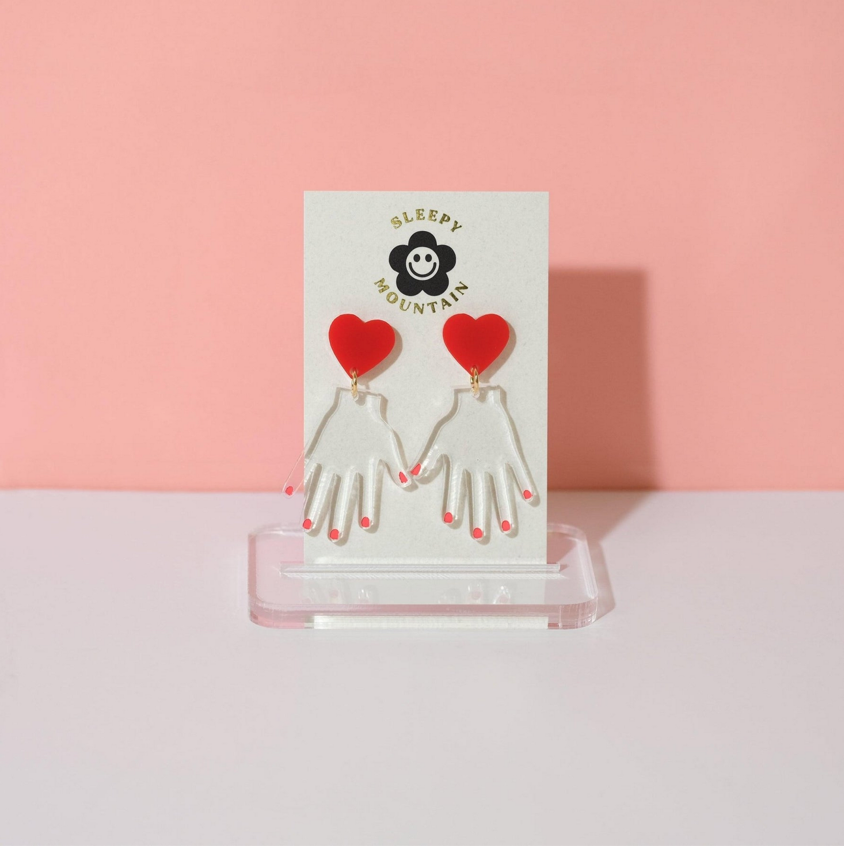 Heart In Hand Dangle Earrings