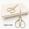 Silver and Gold scissors